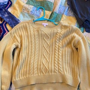 yellow sweater